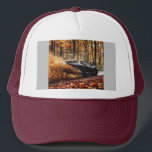 Inferno Run – Black Velocity Through Autumn Flame Trucker Hat<br><div class="desc">A matte black sports car rips through a dense autumn forest, its engine screaming as it carves impossible lines between towering trees. A storm of golden, crimson, and fiery orange leaves erupts in its wake, caught in a chaotic dance of speed and color. The camera hugs tight behind, dipping and...</div>
