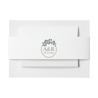 Initials and stylized olive branch wedding invitation belly band