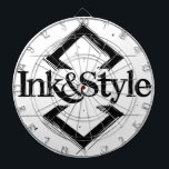Ink&Style Dart Board<br><div class="desc">Be the first to have it! Introducing Ink&Style's first official work, a unique design that combines elegance, artistic strokes, and character geometry. This piece is more than a logo: it's a statement of style, creativity and visual identity. Ideal for decorative paintings, puzzles, bags, posters or any object with a soul....</div>
