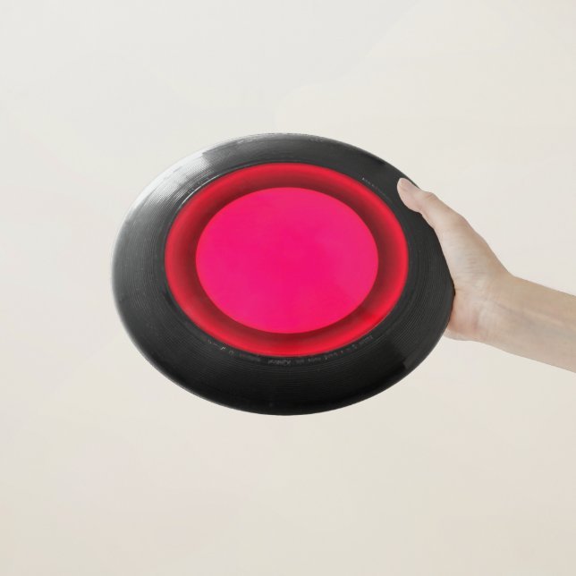 Intense Red Light Wham-O Frisbee (In Hand)