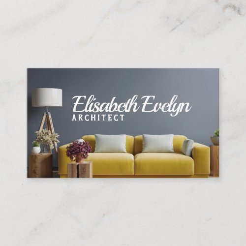 Interior dark blue wall with yellow sofa business card