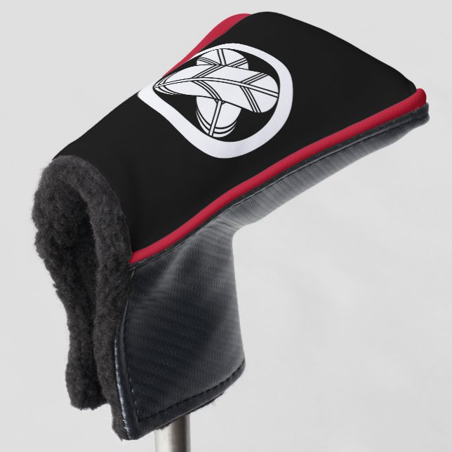 Intersecting hawk feathers in circle golf head cover (3/4 Front)