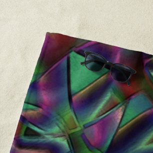 Interwoven tapes of darkened colorful beach towel