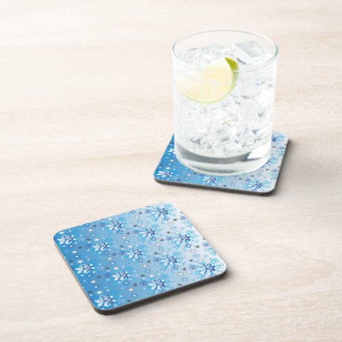 Intricate blue and white stars and snowflakes beverage coaster