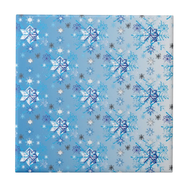 Intricate blue and white stars and snowflakes ceramic tile (Front)