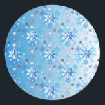 Intricate blue and white stars and snowflakes classic round sticker<br><div class="desc">Intricate blue and white stars and snowflakes holiday pattern. Need more? Check out other holiday designs at my store! Cheers! :)</div>