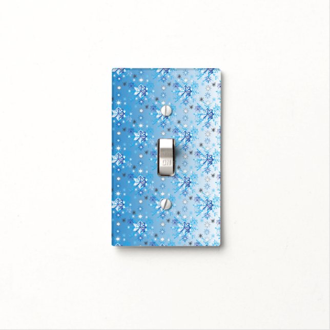 Intricate blue and white stars and snowflakes light switch cover (In Situ)