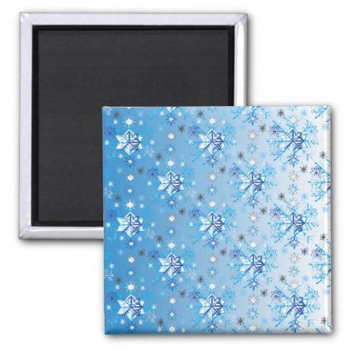Intricate blue and white stars and snowflakes magnet
