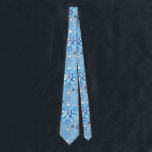 Intricate blue and white stars and snowflakes neck tie<br><div class="desc">Intricate blue and white stars and snowflakes holiday pattern. Need more? Check out other holiday designs at my store! Cheers! :)</div>