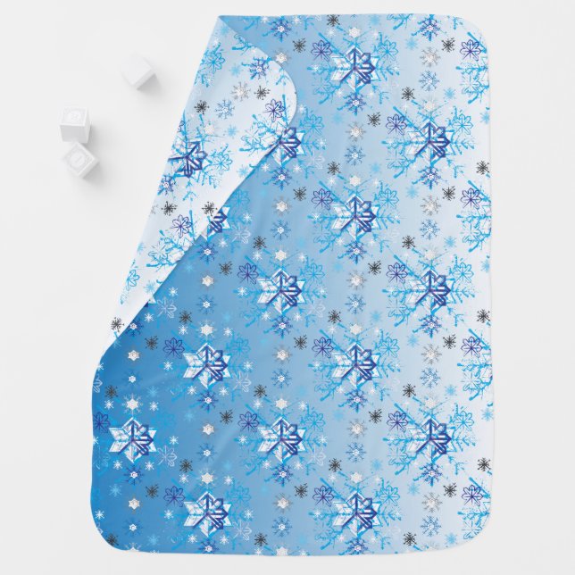 Intricate blue and white stars and snowflakes stroller blanket (In Situ)