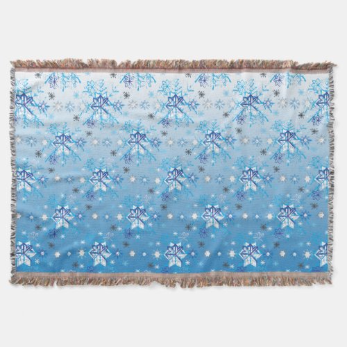 Intricate blue and white stars and snowflakes throw blanket
