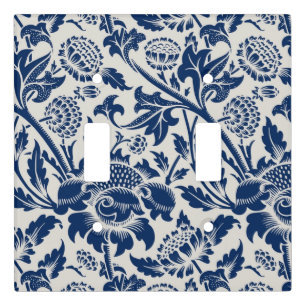 Intricate blue floral pattern on light background switch cover