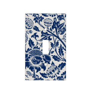 Intricate blue floral pattern on light background switch cover