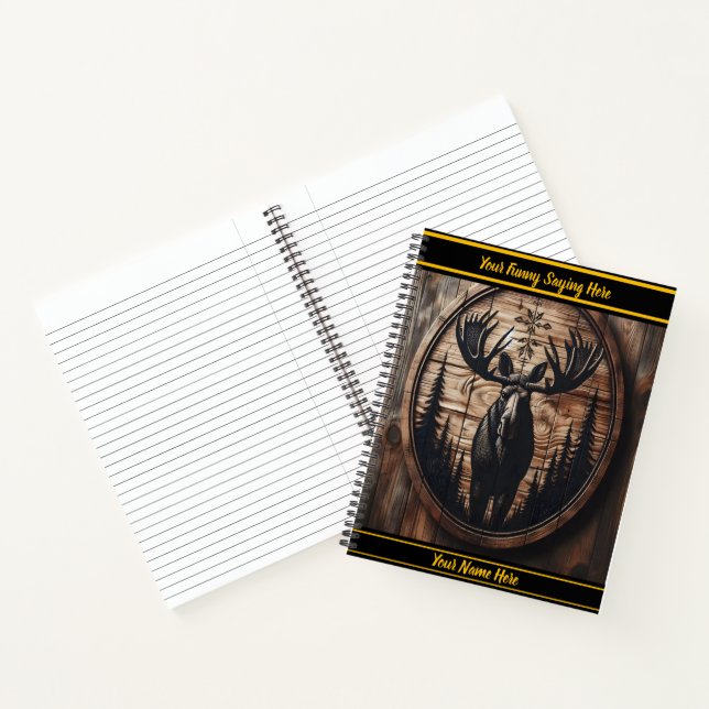Intricate moose carving in forest notebook (Inside)