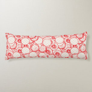 Intricate textile design featuring red, gold, and body pillow