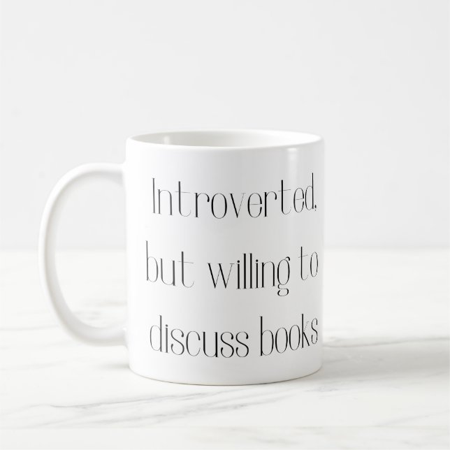 Introverted, but willing to discuss books mug (Left)