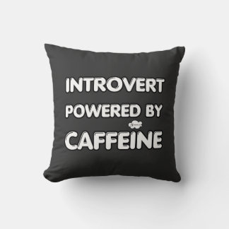 Introverted powered by caffeine throw pillow