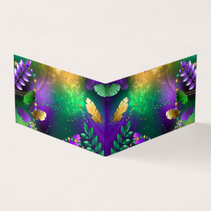 Iridescent mardi gras background with beads