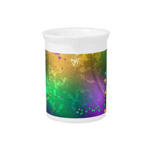 Iridescent mardi gras background with beads beverage pitcher