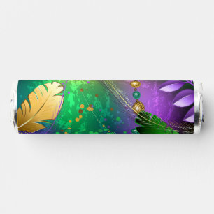 Iridescent mardi gras background with beads breath savers® mints
