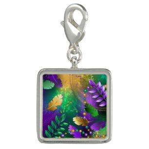 Iridescent mardi gras background with beads charm