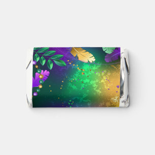Iridescent mardi gras background with beads hershey's miniatures