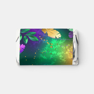 Iridescent mardi gras background with beads hershey's miniatures