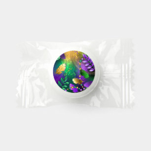 Iridescent mardi gras background with beads life saver® mints