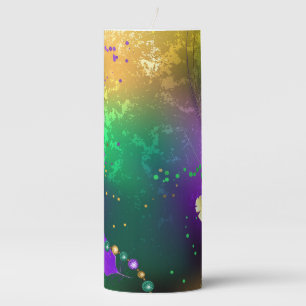 Iridescent mardi gras background with beads pillar candle