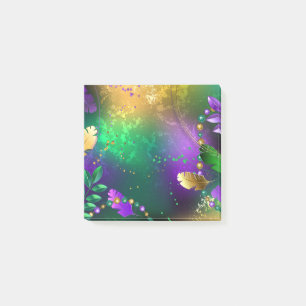 Iridescent mardi gras background with beads post-it notes
