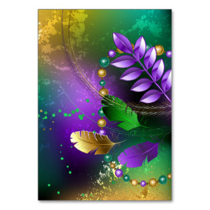 Iridescent mardi gras background with beads table number