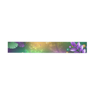 Iridescent mardi gras background with beads wrap around address label