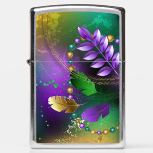 Iridescent mardi gras background with beads zippo lighter