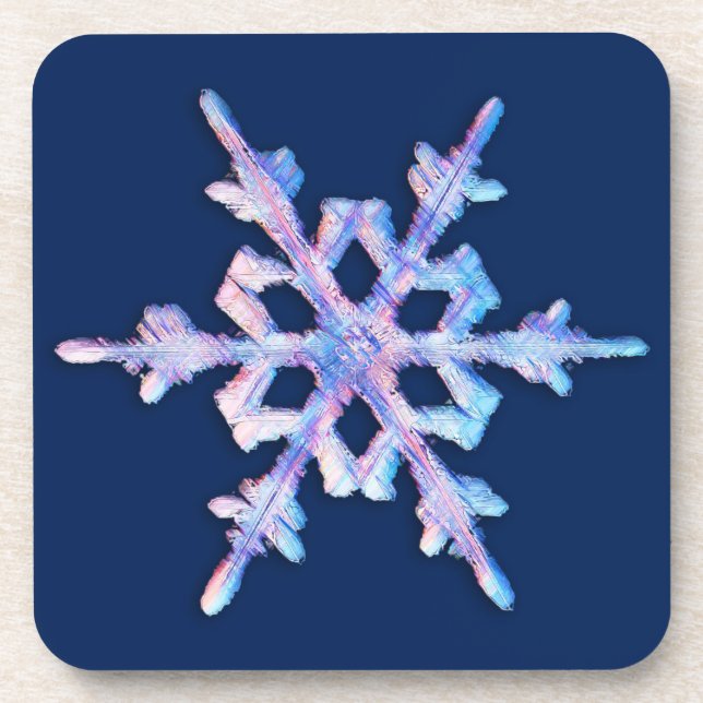 Iridescent snowflake on dark blue beverage coaster (Front)