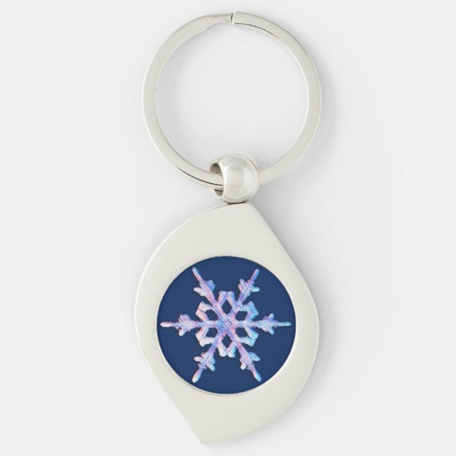 Iridescent snowflake on dark blue keychain (Front)