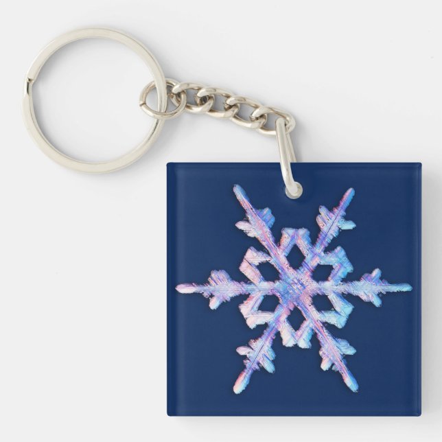 Iridescent snowflake on dark blue keychain (Front)