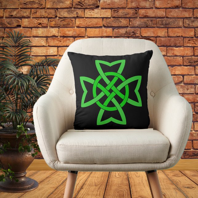 Irish Green Celtic Knot Throw Pillow (Vibrant green Irish Celtic Knot on black decorative pillow.)