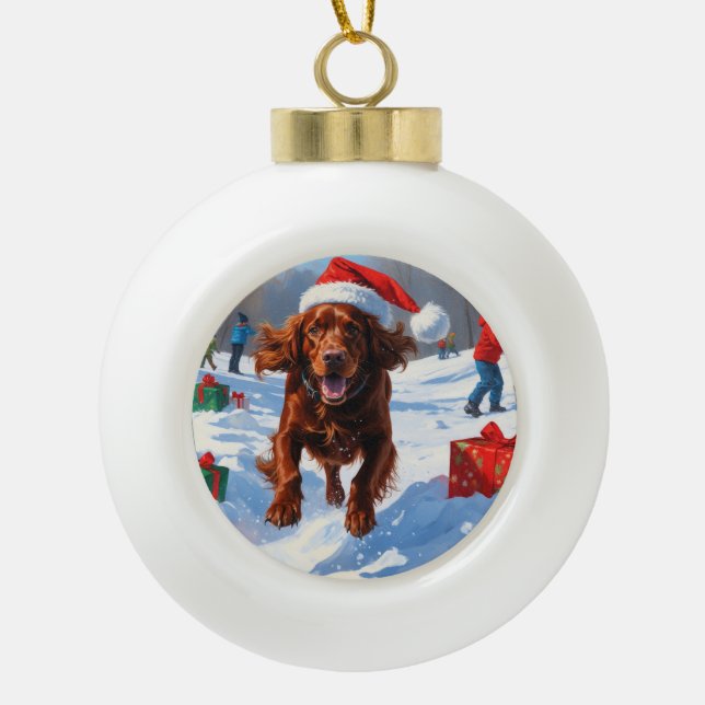 Irish Red Setter Running Snow with Christmas Hat Ceramic Ball Christmas Ornament (Front)