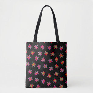 Irregular grassplot including blossoming osteosper tote bag