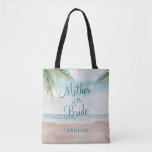 Island Breeze Painted Beach Mother of the Bride Tote Bag<br><div class="desc">Island Breeze Painted Beach Scene, with Ocean Waves, Sandy Beach, and Palm Trees, with a beautiful teal blue sky. With Modern Typography Script Fonts. A Summer Tropical Beach, Or destination wedding design - Personalized Mother of the Bride Tote Bags! ~ Check my shop to see the entire wedding suite for...</div>
