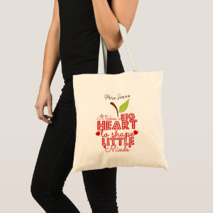 it takes a big heart to shape little minds apple tote bag