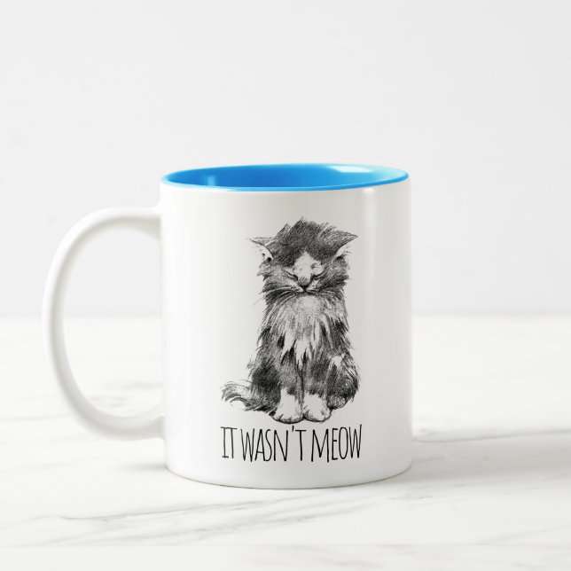 It Wasn't Meow Cute Fluffy Kitten Two-Tone Coffee Mug (Left)