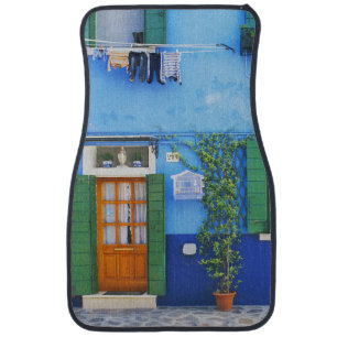 Italy, Burano. A colorful house in Burano near Car Mat