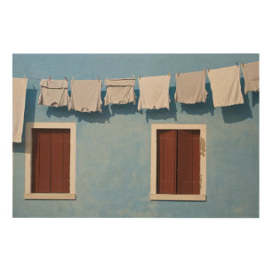 Italy, Burano. Hanging laundry and windows along Wood Wall Decor