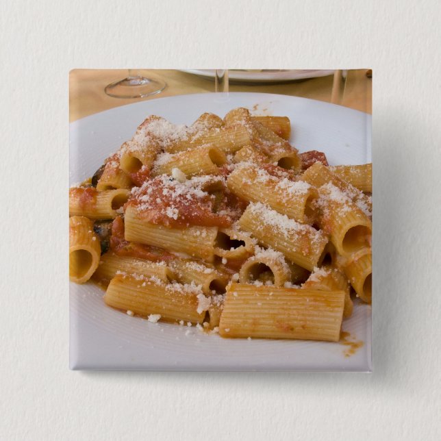 Italy, Positano. Display plate of rigatoni. Button (Front)