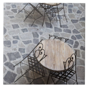 Italy, Sardinia, Castelsardo. Cafe tables. Ceramic Tile