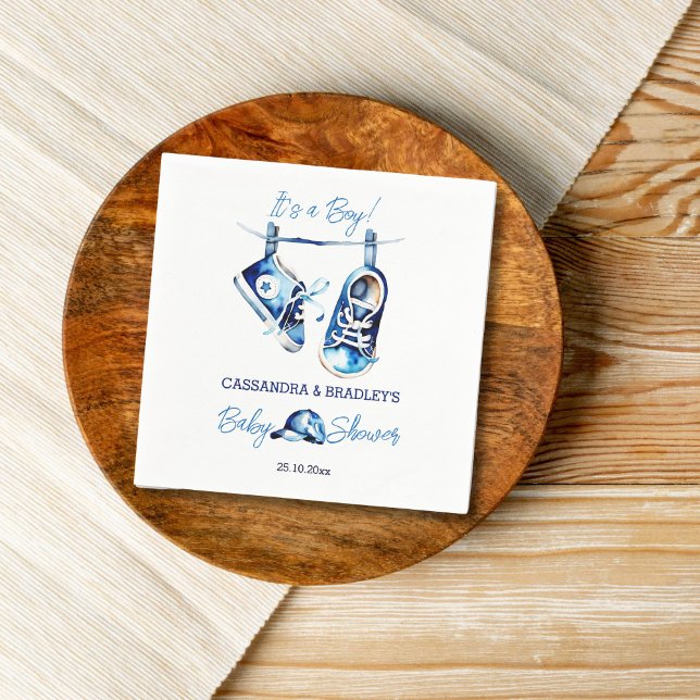 It's a boy blue baby sports shoe cap baby shower napkins (It's a boy baby shower tableware personalized napkins blue baby sports shoes hanging on a line cap)