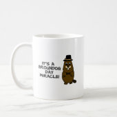 It's a groundhog day miracle coffee mug (Left)