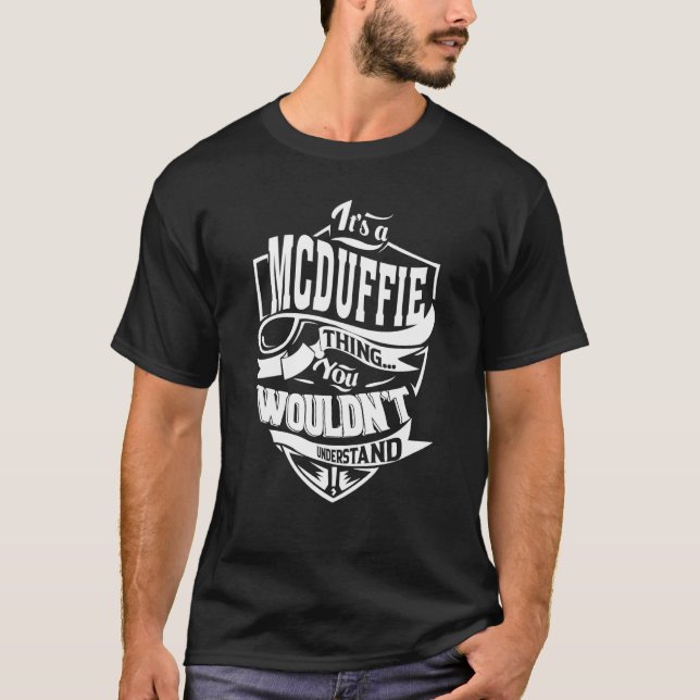 It's a MCDUFFIE Thing T-Shirt (Front)