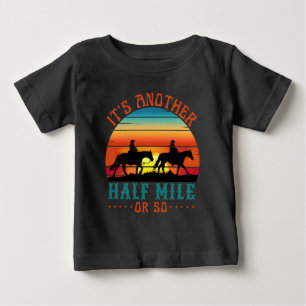 it's another half mile or so baby T-Shirt